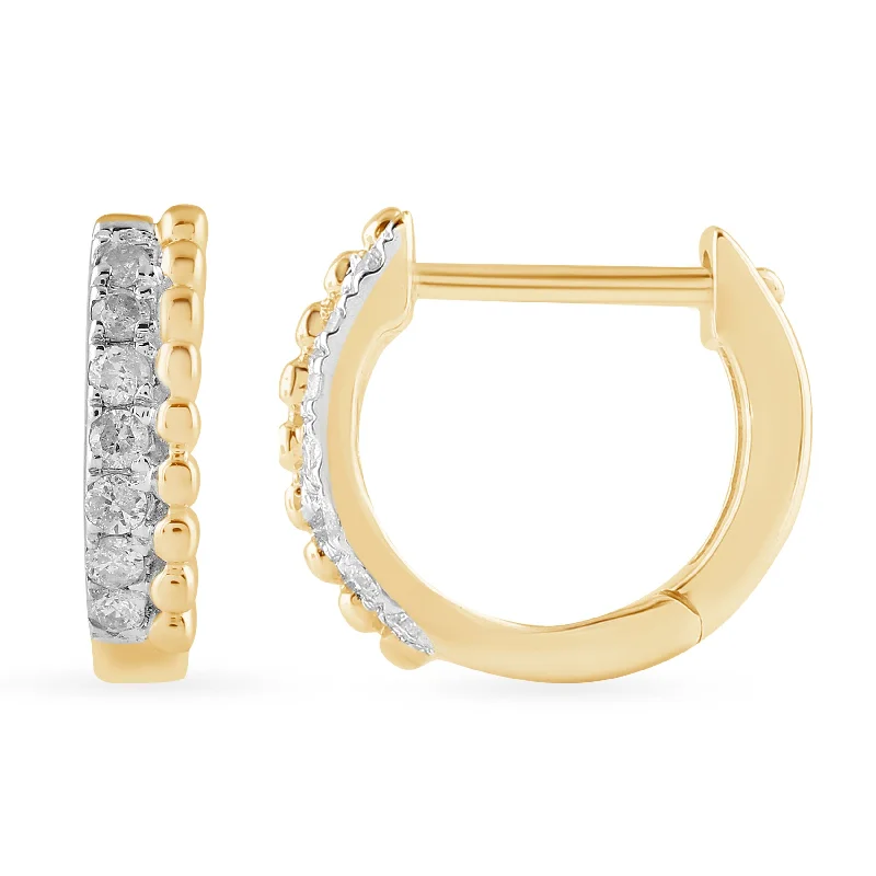 trendy statement earrings for women -Huggie Hoop Earrings with 0.10ct of Diamonds in 9ct Yellow Gold