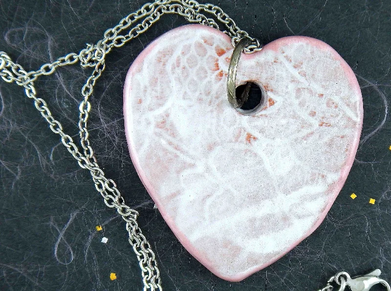 classic gold necklaces for women -16-inch necklace with off-white ceramic heart pendant handmade in Montreal, lace pattern, stainless steel chain