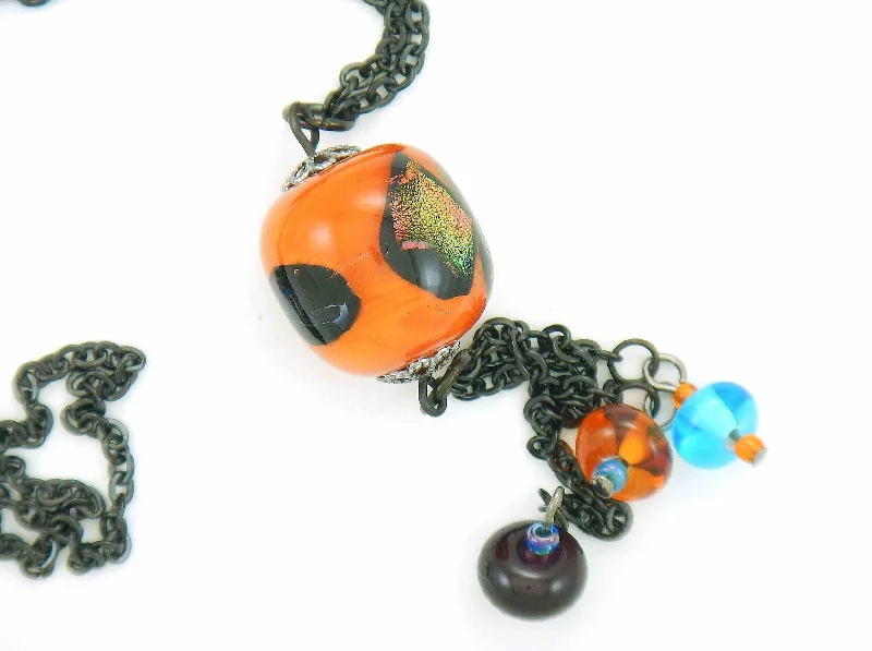 modern gemstone necklaces for women -27-inch necklace with elongated glass ball and matching pendants in bright orange-black-blue (Murano-style glass handmade in Montreal), black stainless steel chain