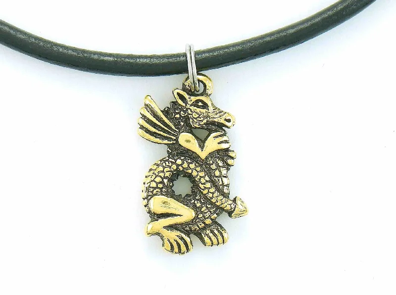 sapphire necklaces for women -Choker necklace with gold-toned pewter dragon pendant on black leather, stainless steel clasp